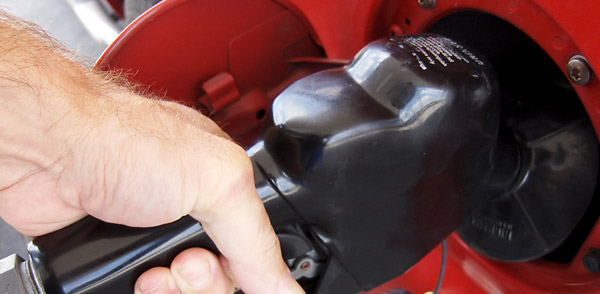 Petrol prices, petrol pump and hand