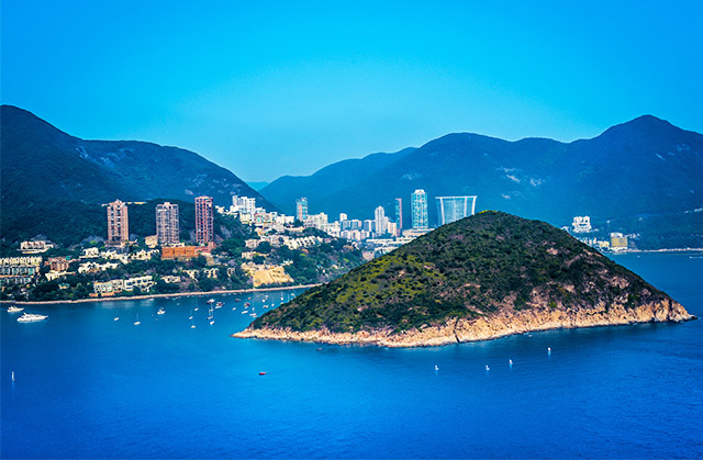 Taking a dream holiday has topped Britain's goals for 2014 but financial worries remain a barrier
